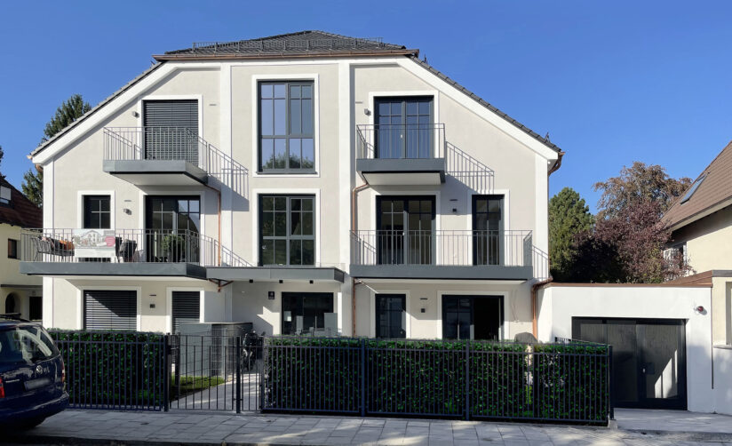 Ansicht eines Neubau Mehrfamilienhauses von DOMINO Bau in München Nymphenburg-Gern