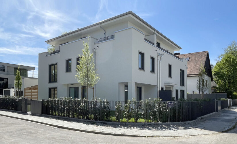 Modernes Dreifamilienhaus Neubau von DOMINO Bau in Solln München