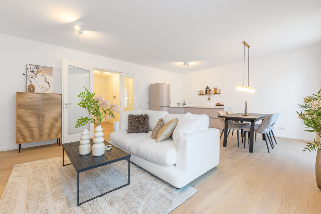 Photo of a living room in a new multi-family house with five apartments and underground parking by DOMINO Bau on Thaddäus-Eck-Straße in Munich-Obermenzing