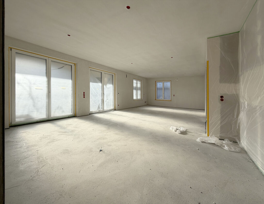 Photo of a shell construction of a five-apartment building by DOMINO Bau in Munich Nymphenburg (Jan 26)