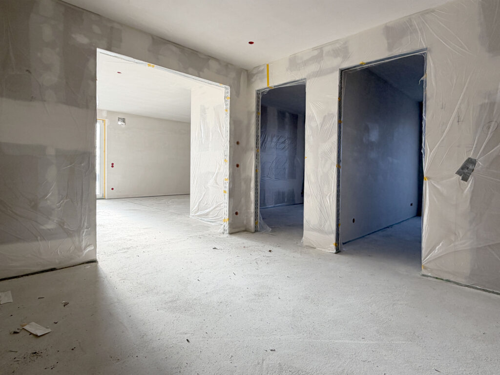 Photo of a shell construction of a five-apartment building by DOMINO Bau in Munich Nymphenburg (Jan 26)