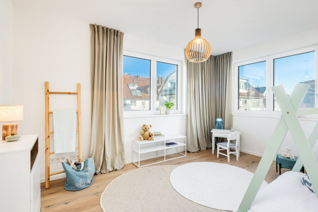 Image of a pleasant children's room on the upper floor of a ready-to-move-in new apartment in Trudering by Domino Bau