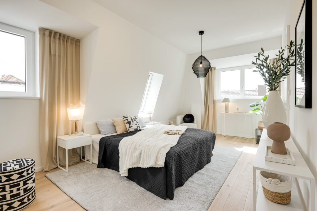 Photo of a bedroom in the attic of a new, move-in-ready apartment in Trudering by Domino Bau