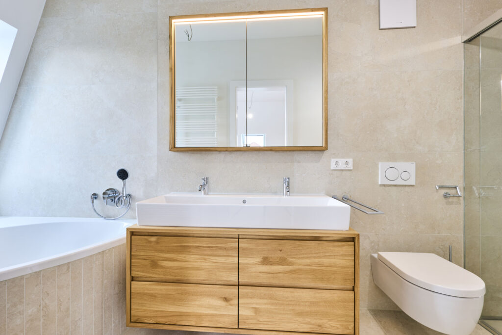 Photo of a bathroom in the attic of a new apartment in Trudering, ready for occupancy, by Domino Bau