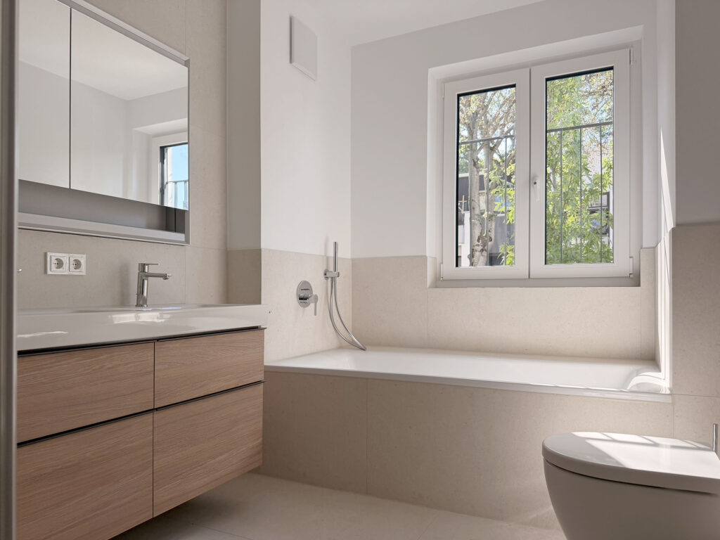 Photo of a bathroom in the completed apartment at Wastelbauerstraße 10 in Obermenzing by Domino Bau