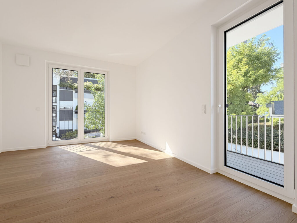 Photo of a bedroom in the completed apartment at Wastelbauerstraße 10 in Obermenzing by Domino Bau