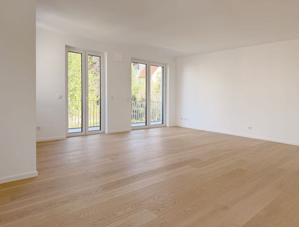 Photo of a living room in the completed apartment at Wastelbauerstraße 10 in Obermenzing by Domino Bau